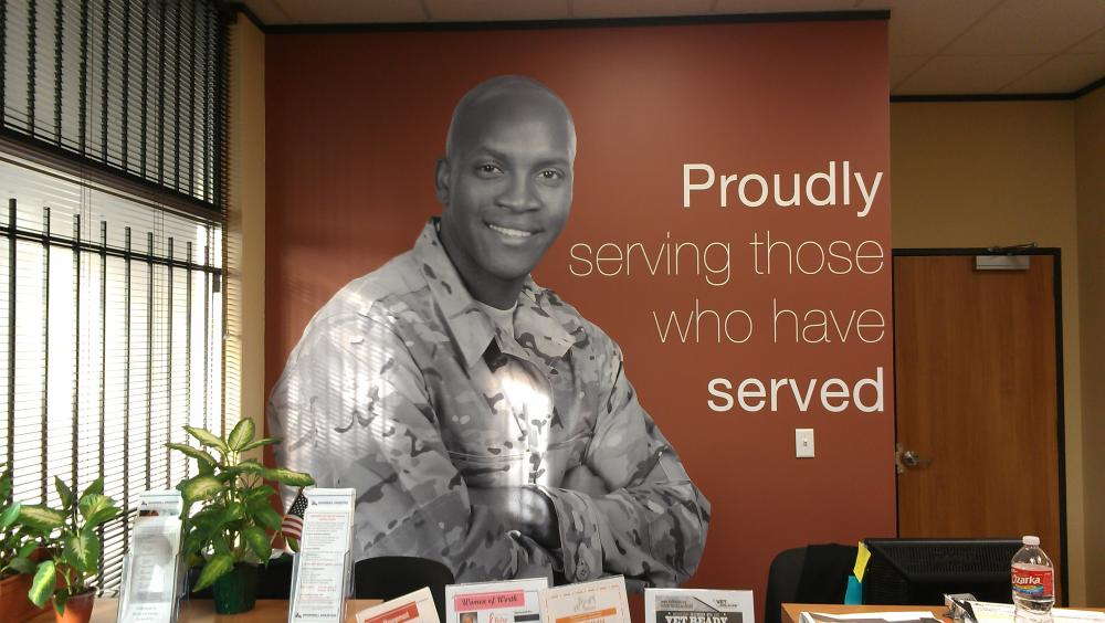 Wall mural promoting veterans in an office