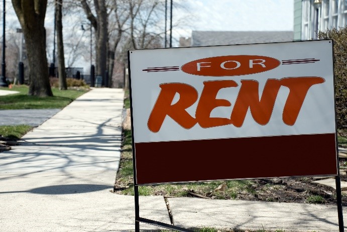 A Frame sign announcing property for rent