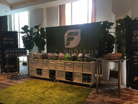 Trade show display promoting Flourish products