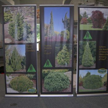 3 retractable banners with various trees and shrubs