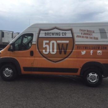 A vehicle wrap on a white van for Brewing CO 50 W