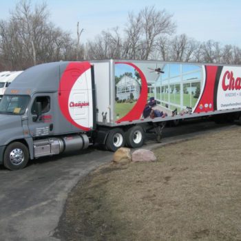 A large vehicle wrap on an eighteen-wheeler for Champion