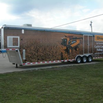 A large vehicle wrap in a trailer for Ohio CAT