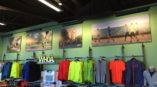 Multiple retail graphics at an athletic apparel store