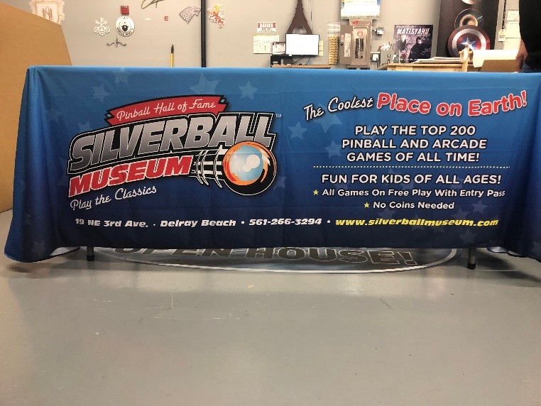 A printed fabric graphic on a table for the silverball museum 