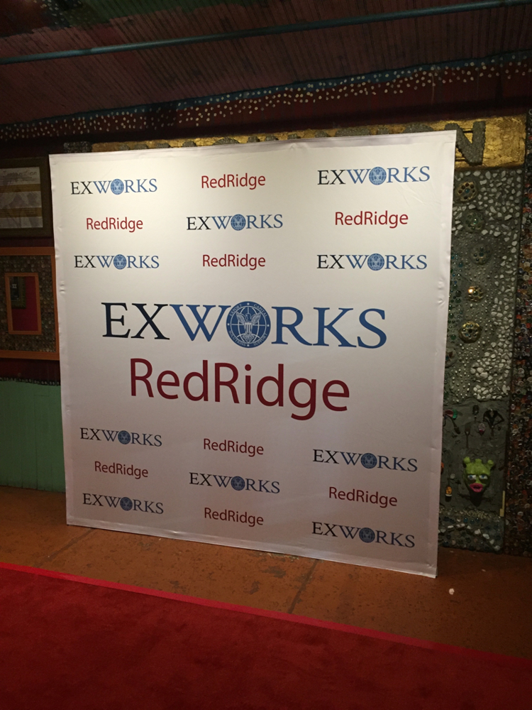 A large standing banner indoors for an event