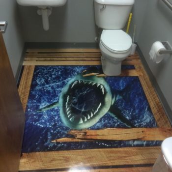 Shark floor graphics in bathroom