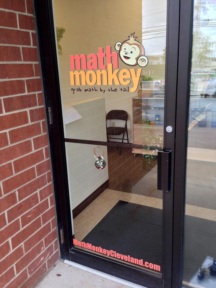 Math Monkey logo graphic on door