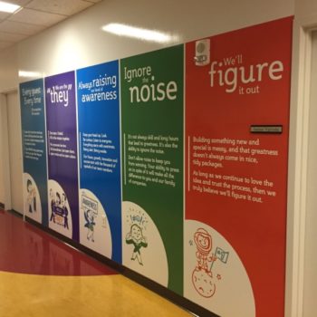Colorful wall graphics in a halway