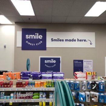 smile direct signage in pharmacy