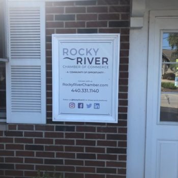 Rocky River sign on outside of building