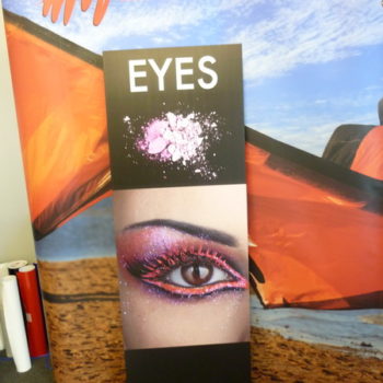 Banner featuring an eye wearing pink eyeshadow