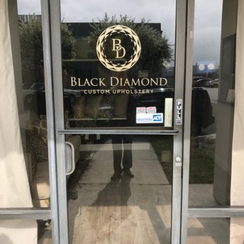 Black Diamond custom upholstery door logo
