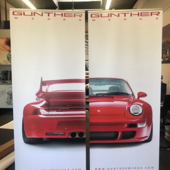 White banners featuring a red car