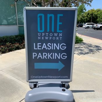 One Uptown Newport leasing and parking sign