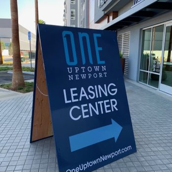 Pop-up sign created for One Uptown Newport to advertising that they are now leasing 