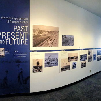 Wall mural featuring a timeline with black and white images created by SpeedPro 