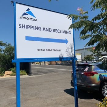 sign by a parking lot for shipping and receiving