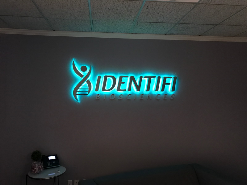 light-up wall logo for Identifi Biosciences