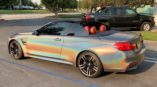 holographic convertible in a parking lot