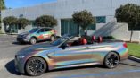 cars with holographic paint in a parking lot