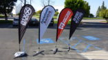 small banners outside a car dealership
