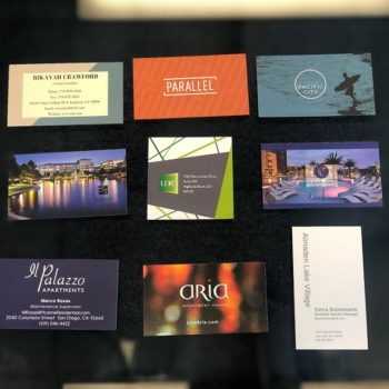 Various business cards on a table