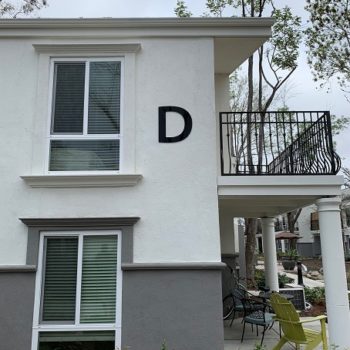 Building with the letter D