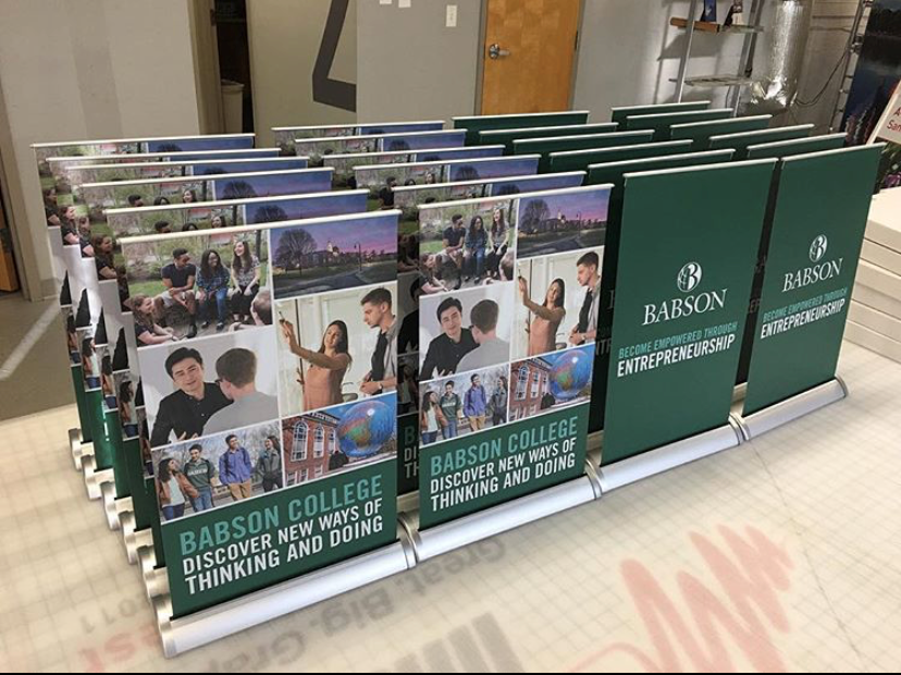 Advertising banner showing brochures on a rack