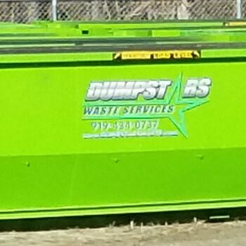 Dumpstars Waste Services logo printed on a dumpster