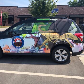 Treasure Quest advertisement wrap on vehicle