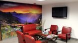 Waiting area with mountain wall mural