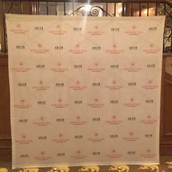 Adler and Women in Space Science step and repeat banner