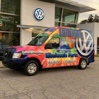 Leith Volkswagen of Hilliard rainbow fleet wrap in front of dealership