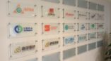 Glass wall hangings with logos