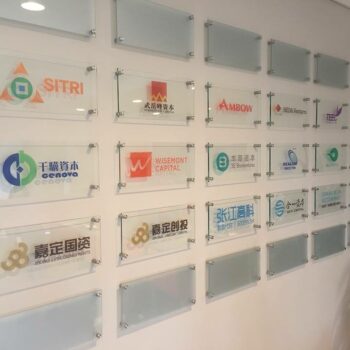 Glass wall hangings with logos