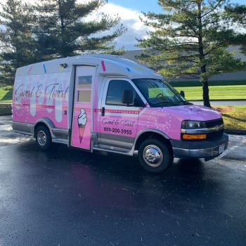 Van with horror-themed custom vehicle wrap