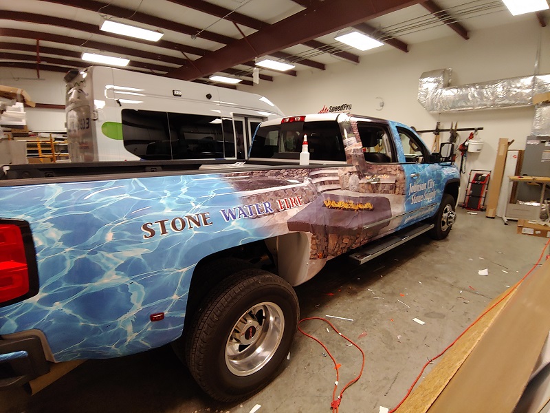 Stone Water Fire vehicle wrap