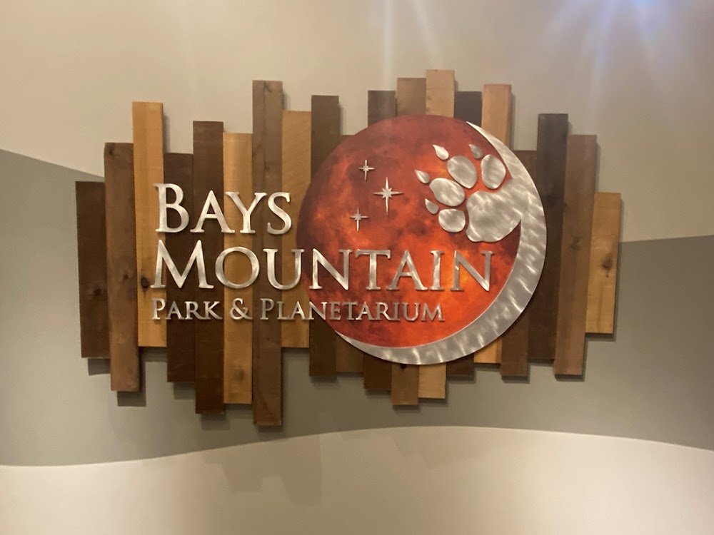 Dimensional metal and wood wall sign with circular graphic in Tri-Cities - Bristol, Johnson City &