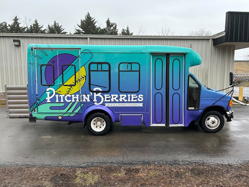 Partial vehicle wrap with colorful graphics and text on a food truck in Tri-Cities - Bristol,
