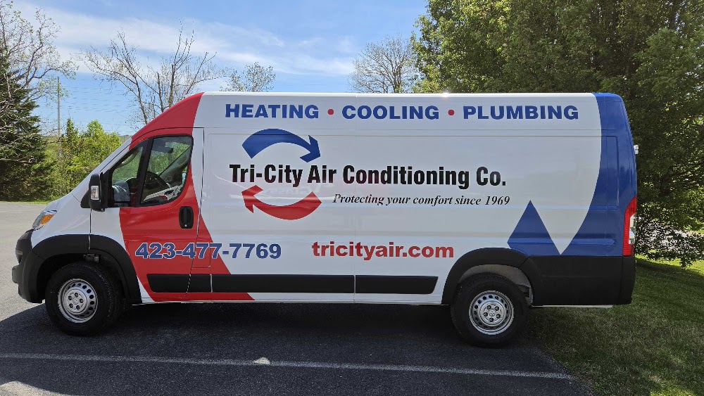 Full fleet wrap with red, white, and blue graphics on a van in Tri-Cities - Bristol, Johnson City &