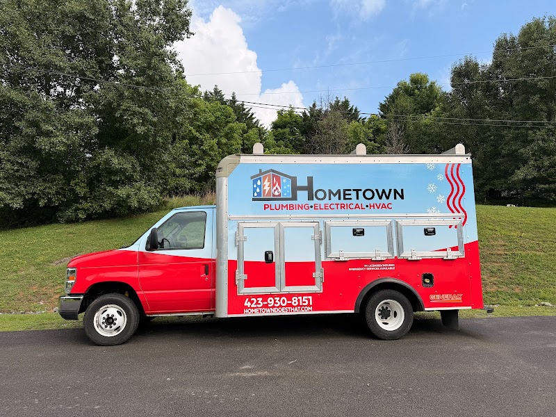 Partial fleet wrap with plumbing electrical HVAC graphics on a red truck in Tri-Cities - Bristol,