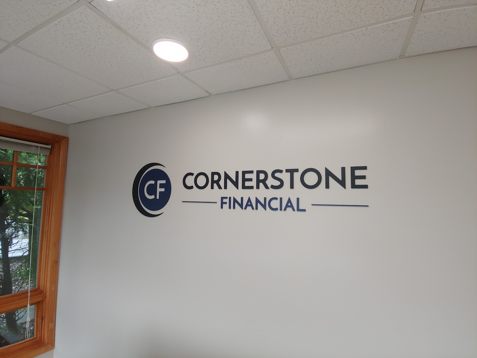 Dimensional wall sign with circular logo and text in Tri-Cities - Bristol, Johnson City & Kingsport.