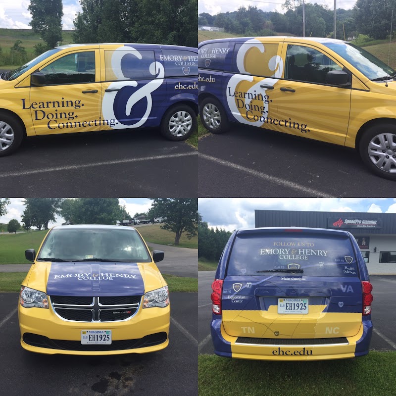 Full vehicle wrap with blue and yellow graphics on a Dodge van in Tri-Cities - Bristol, Johnson City