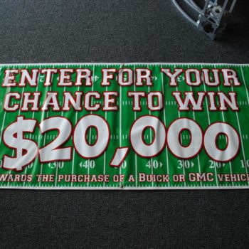 GMC football field banner for chance to win 