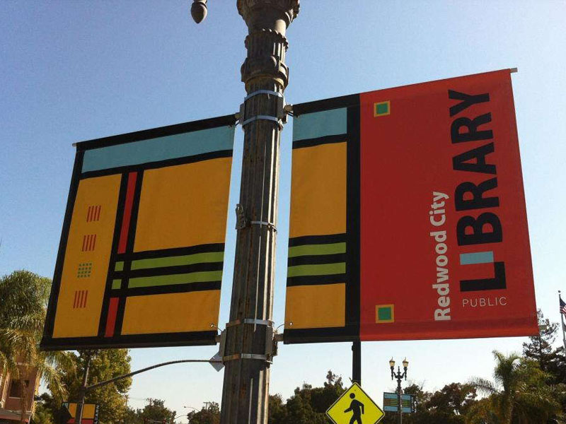 Redwood city public library outdoor banners on pole