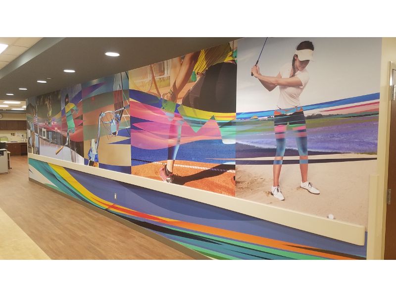 Wall mural in hallway with athletes