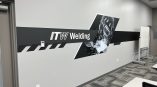 Wall graphic with printed vinyl and cut vinyl lettering in an office space in Dayton, Ohio.