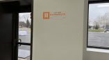 Small rectangular vinyl wall decal with orange and black graphics in Dayton, Ohio.