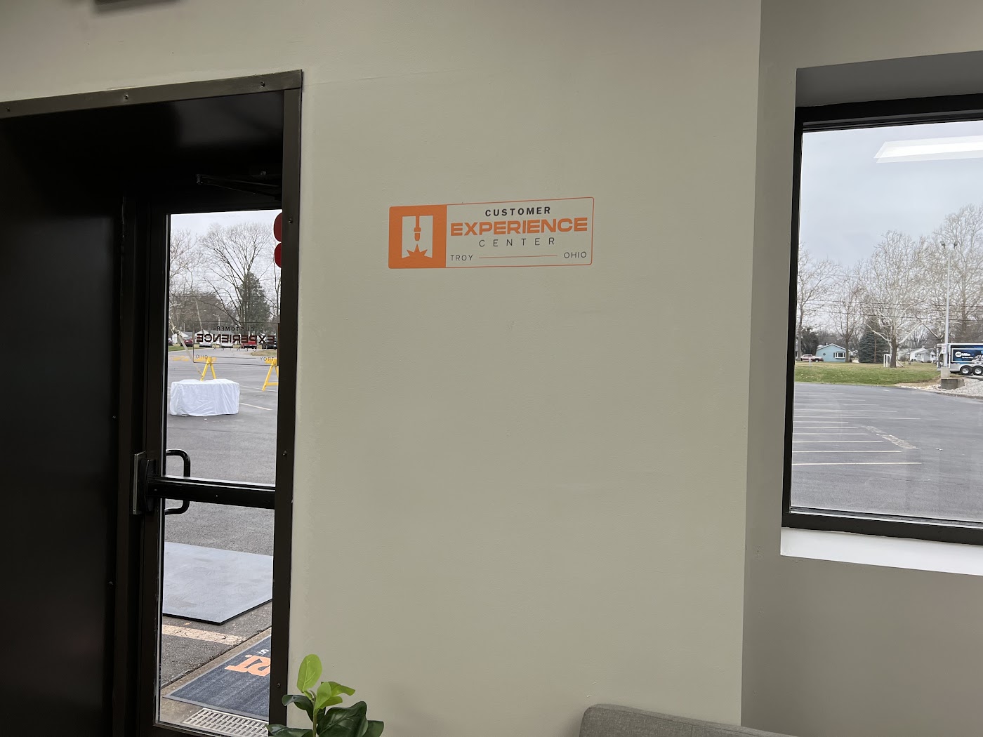 Small rectangular vinyl wall decal with orange and black graphics in Dayton, Ohio.